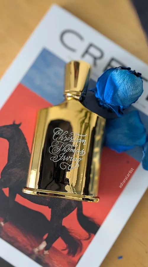 Hand-engraved Creed Millésime Gold perfume bottle, personalized for a client at Yorkdale, Toronto.