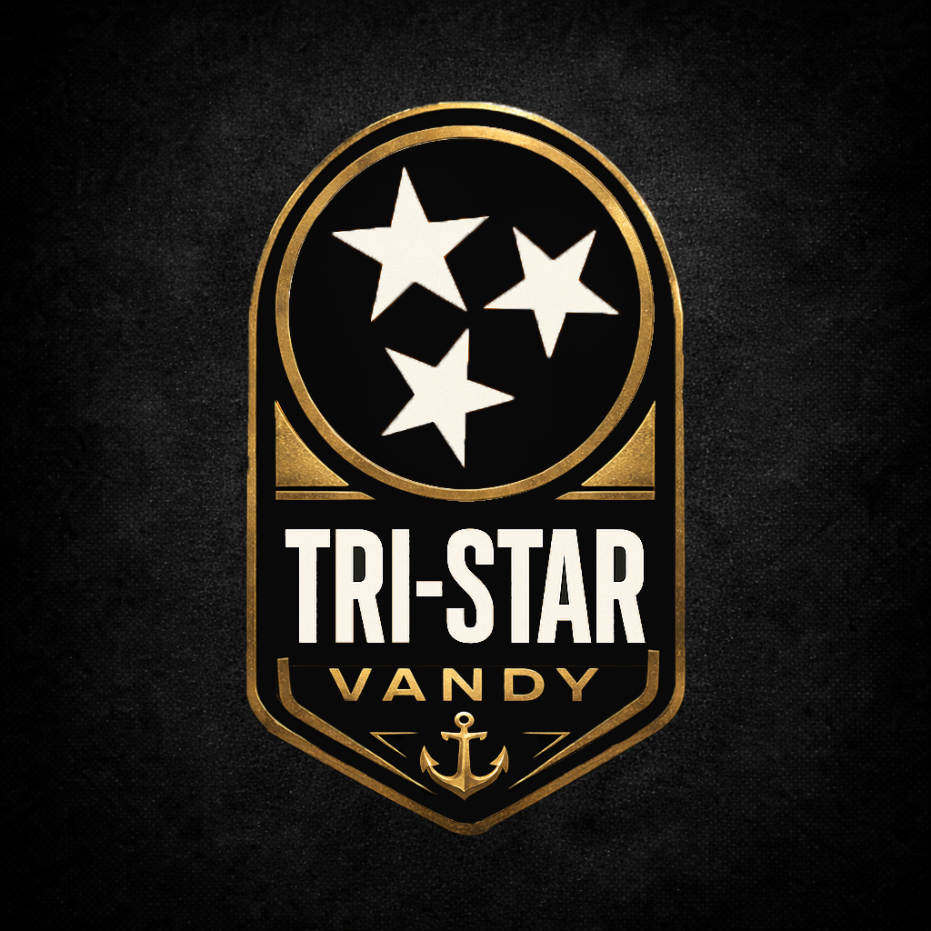 A black and gold  Vanderbilt like badge featuring three white stars at the top, the words 'TRI-STAR' in large white letters, 'VANDY' in smaller gold letters underneath, and a gold anchor at the bottom against a dark textured background.