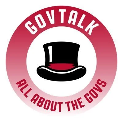 Logo for Gov Talk, an Austin Peay coverage brand, surrounded by the words 'GovTalk' at the top and 'All About The Govs' at the bottom in red text on a pink gradient background.