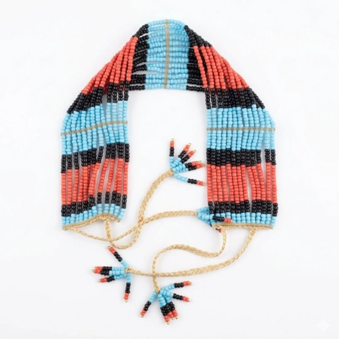 Colorful beaded necklace with a geometric pattern in shades of blue, red, black, and tan, designed to resemble traditional indigenous jewelry.