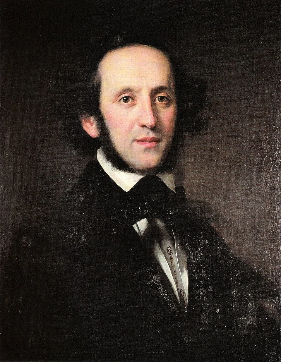 A classical oil portrait of a man with dark, curling hair, wearing formal 19th-century attire, including a black coat, white shirt, and black bow tie, against a dark background.