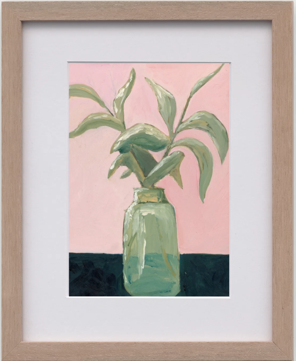 Painting of a green plant in a green glass vase against a pink background with a dark surface.