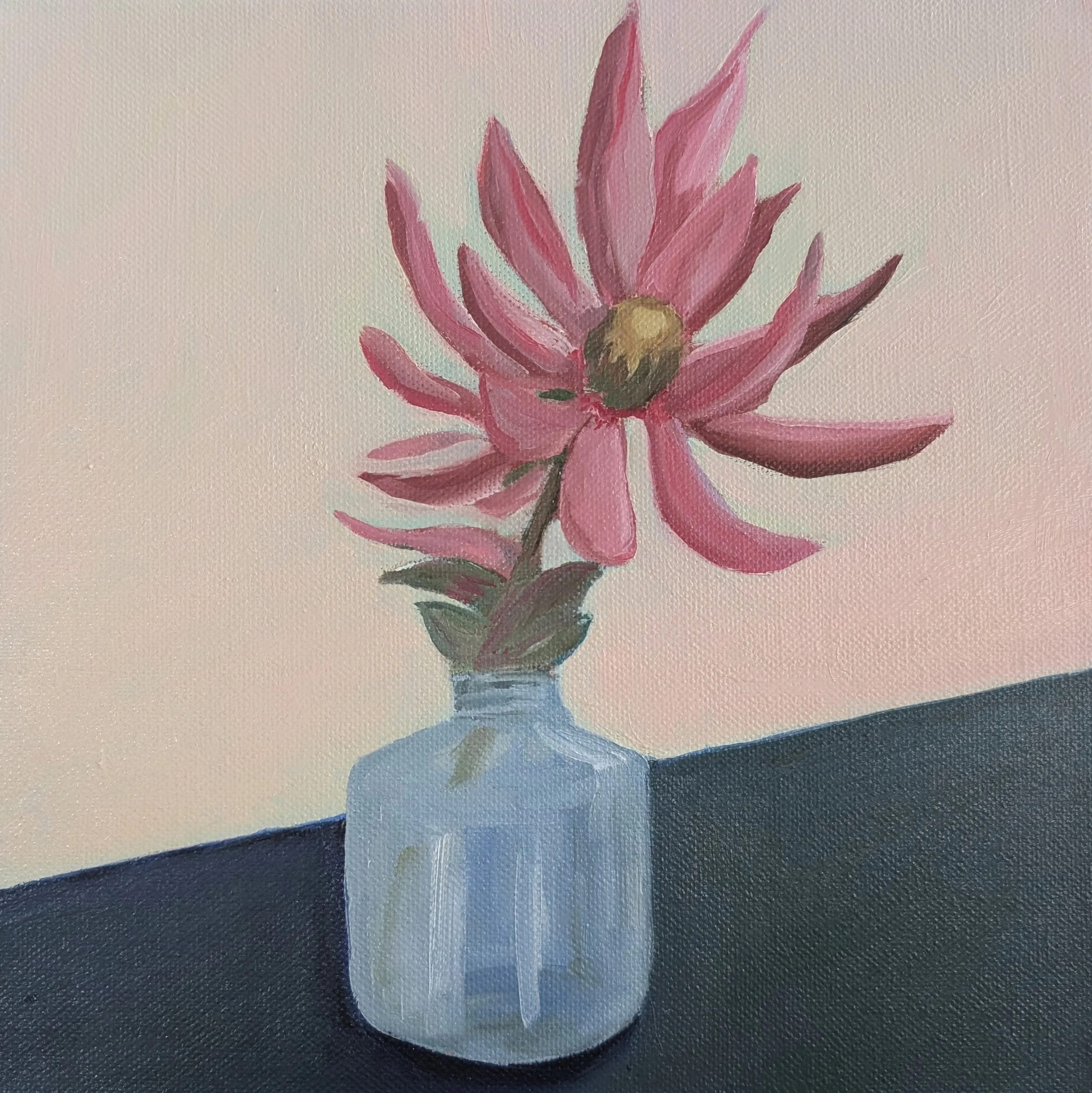 A painting of a pink flower with a yellow center on a canvas background.
