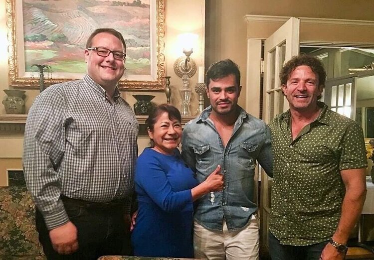 Centro Latino Director Ruth Trott and Centro Latino Board Member Longview Detective Officer Eddie Marlowe with Integrated Care of Greater Hickory CEO Corey Richardson, DHSc, MBA, welcome Brazilian Model and Nutritionist Nilton Cunha (Mr. Brazil 2013…