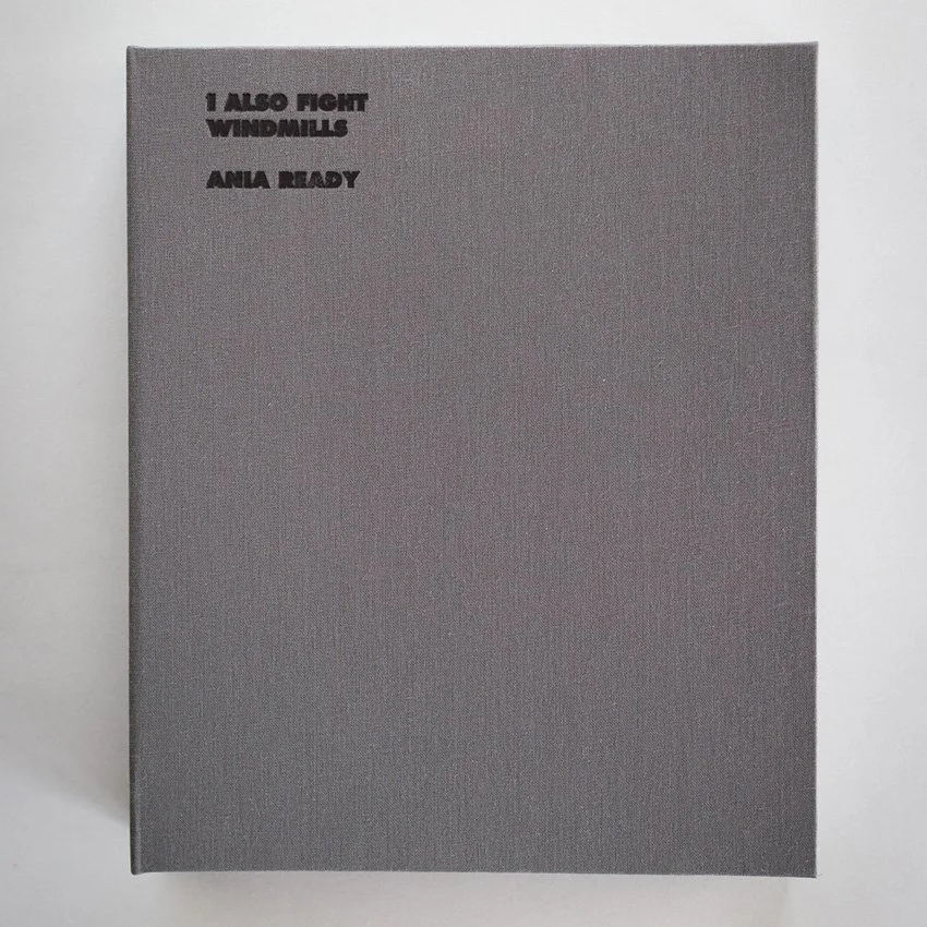Grey handmade presentation box for the I Also Fight Windmills Collector’s Boxed Edition.