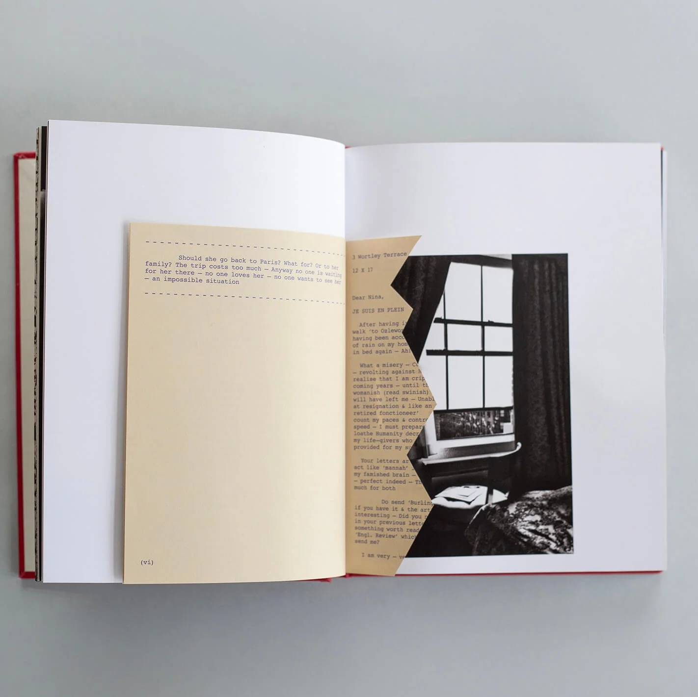 Open I Also Fight Windmills photobook showing handwritten text alongside a black-and-white photograph.