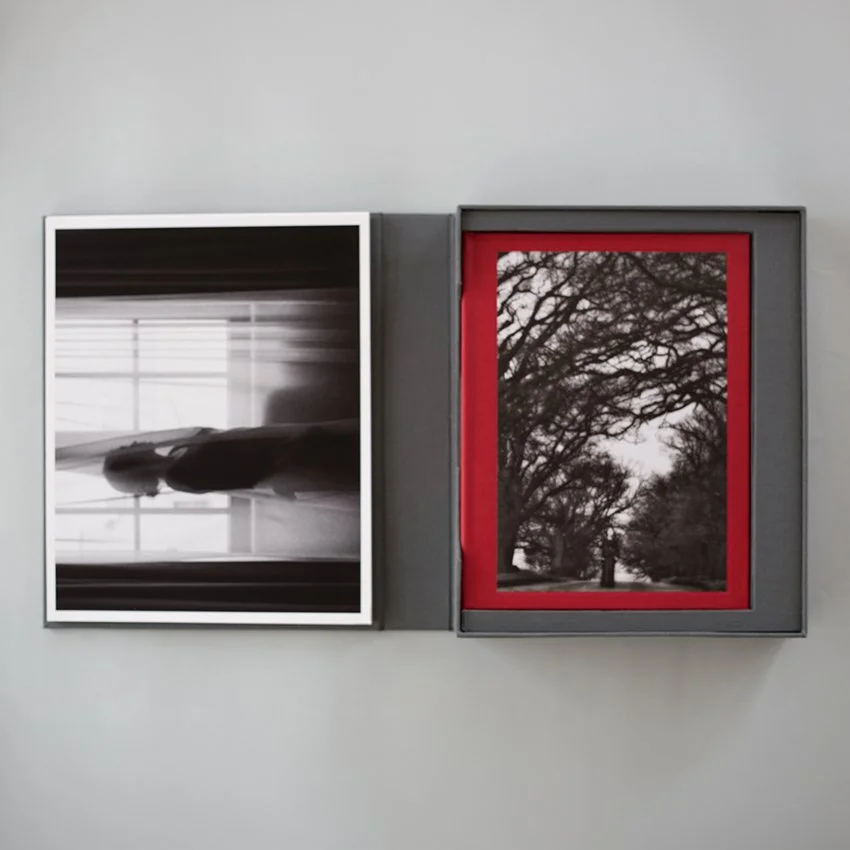 Open I Also Fight Windmills Collector’s Boxed Edition showing the photobook and two black-and-white fine art prints.