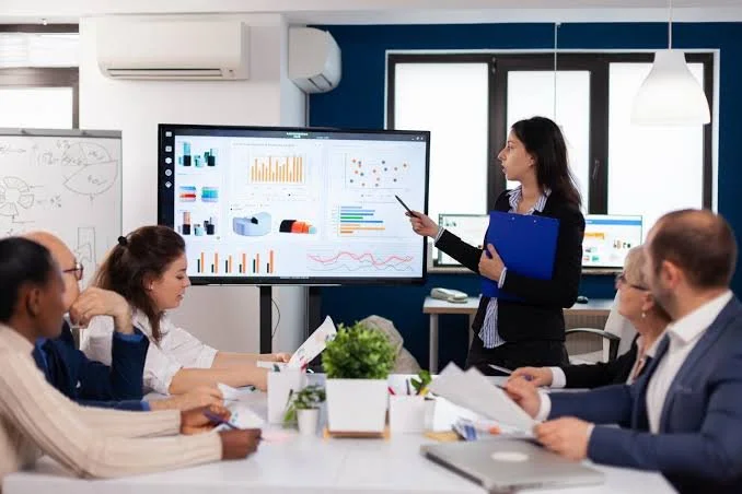 Technology licensing attorney presenting software data to corporate team