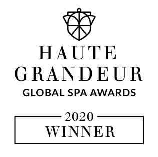 Logo del premio Haute Grandeur Global Spa Awards 2020 con un'icona stilizzata e testo in nero.