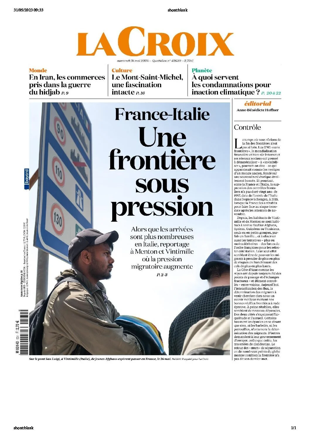 Front page of La Croix newspaper with a headline about France-Italy border under pressure, showing an image of two men, likely Afghan migrants, waiting on a bridge.