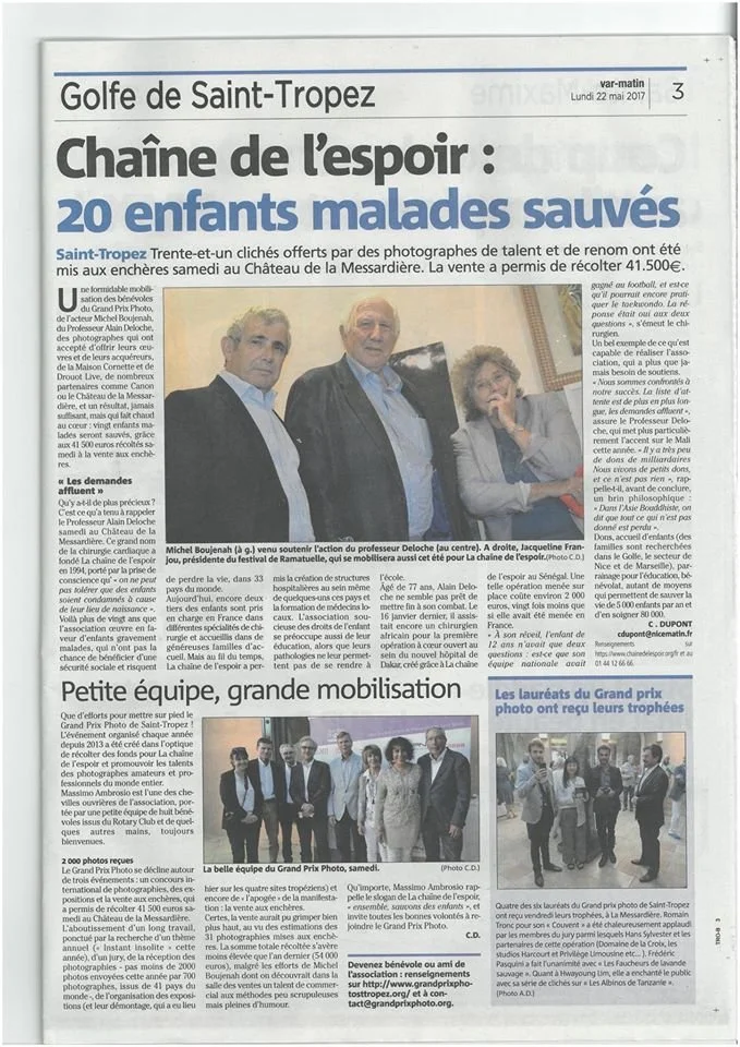 Newspaper clipping titled 'Golfe de Saint-Tropez' with a headline 'Chaîne de l'espoir: 20 enfants malades sauvés'. The article discusses a charity event at Château de la Mésardière where photos were taken by talented photographers to raise funds for 