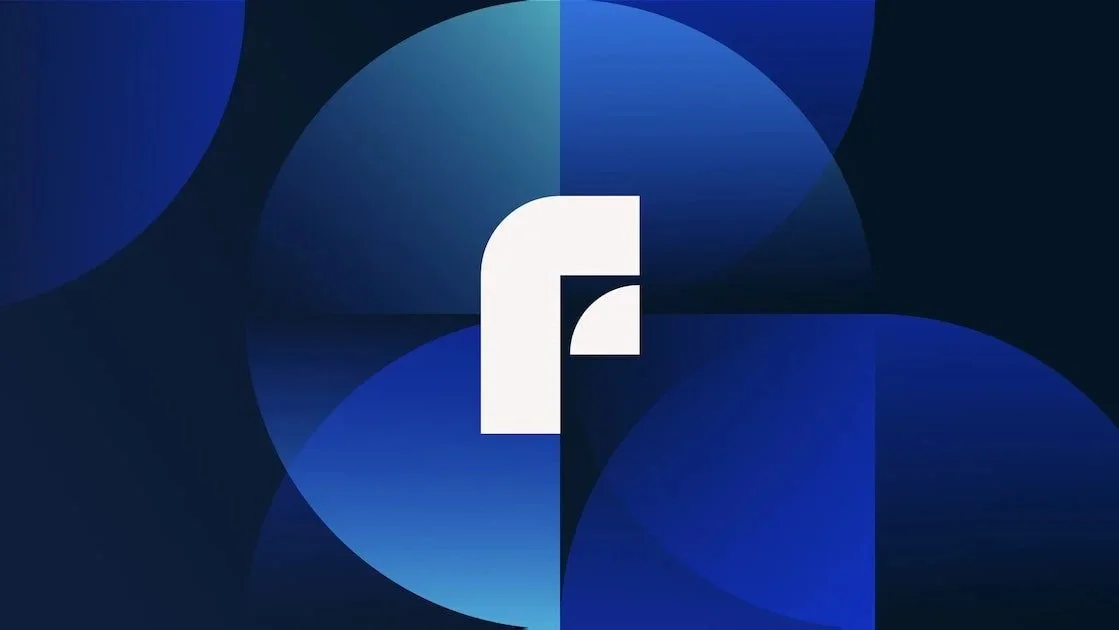 Facebook logo on a background with various shades of blue and abstract circular shapes.