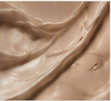 Close-up of a creamy beige substance with smooth texture