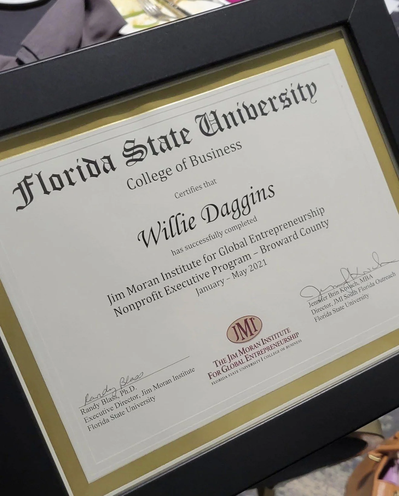 Framed Florida State University College of Business certificate awarded to Willie Daggins for the Jim Moran Institute Nonprofit Executive Program