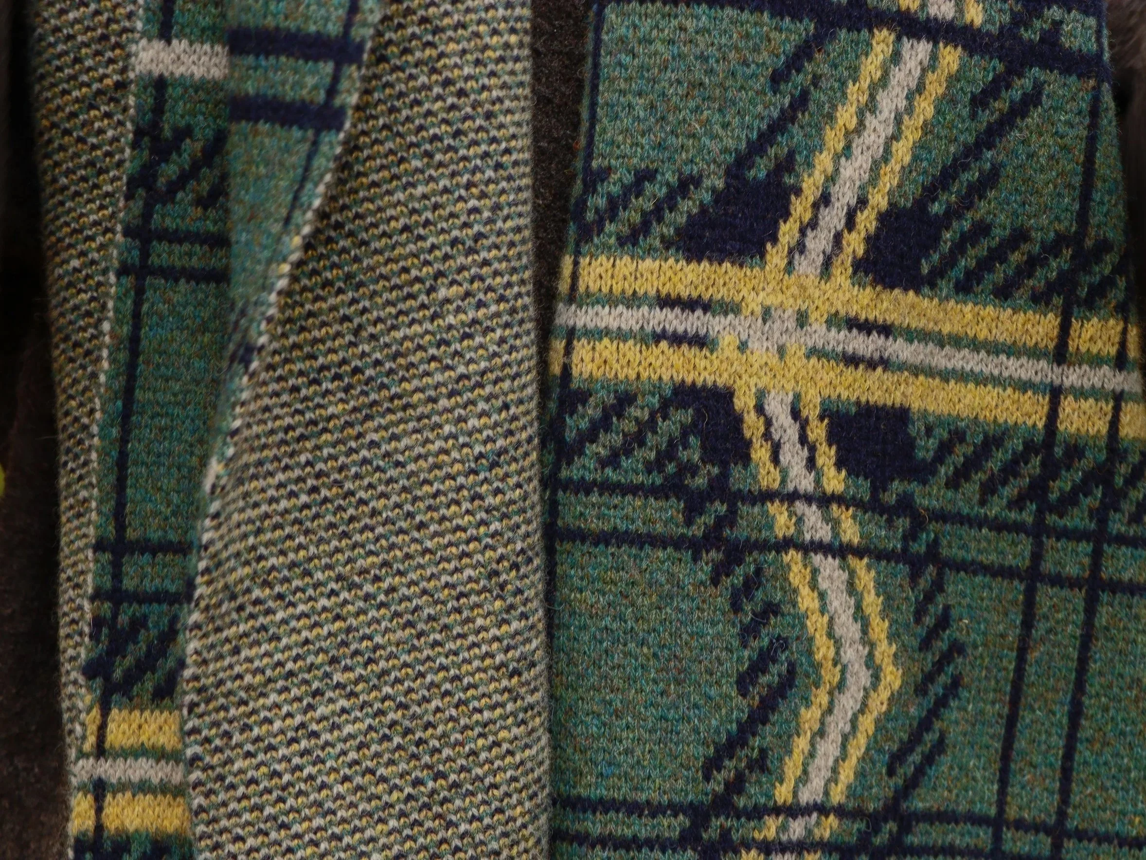 Close-up of 'Lizzie Forbes Tartan' scarf by Lizzie Forbes.