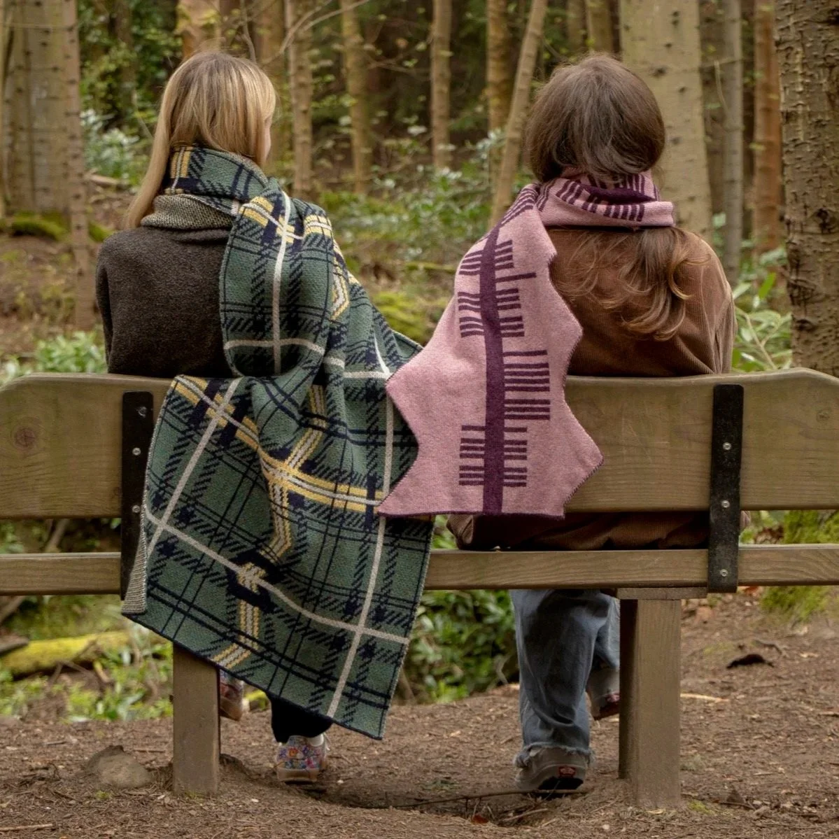 Lizzie Forbes Knitwear 'In the Heather' collection. Featuring 'Lizzie Forbes Tartan' scarf alongside 'watch where you put your boots in the heather scarf'