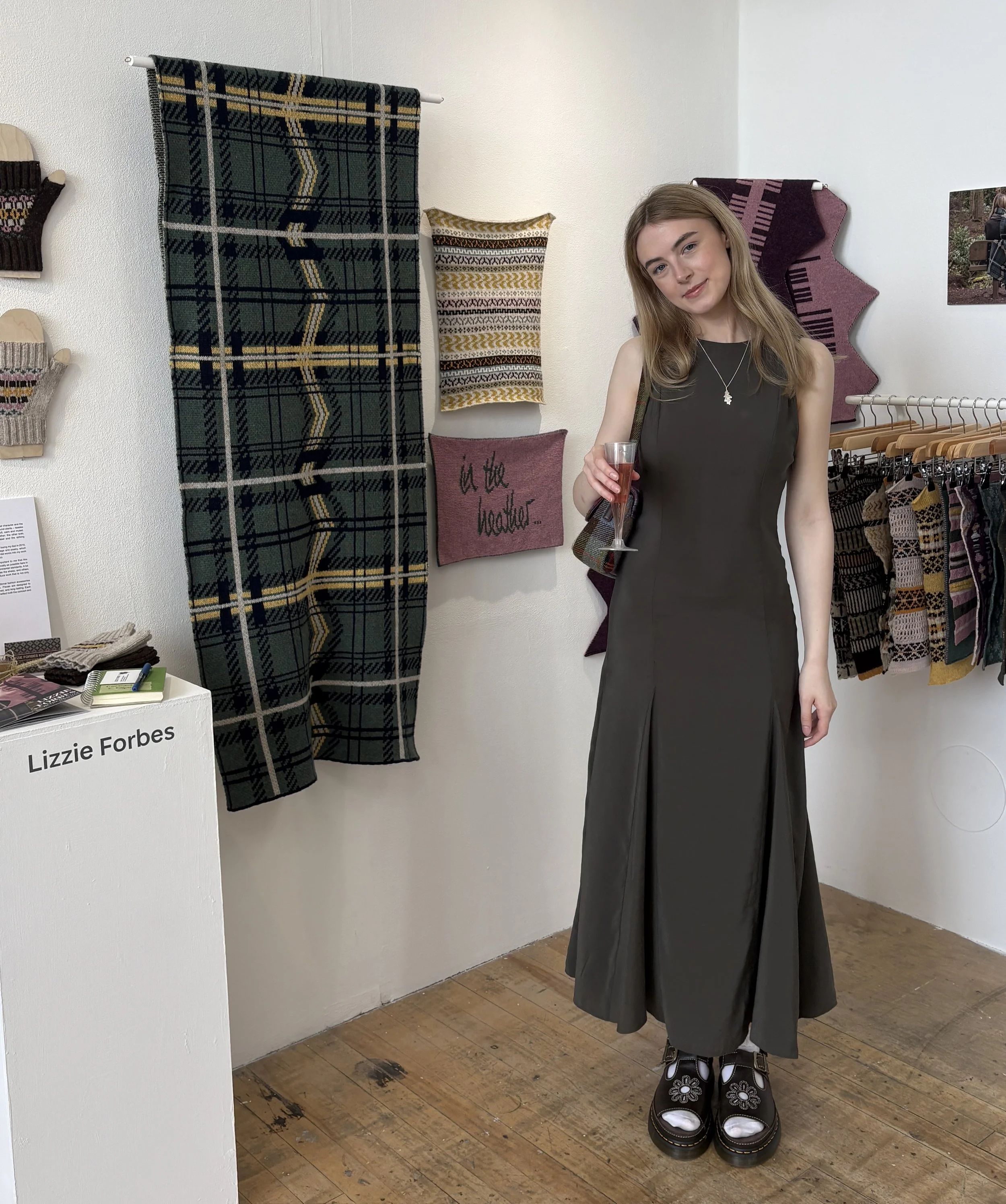 Lizzie Forbes displaying her honours collection 'In the Heather' at the 2026 Duncan of Jordanstone College of Art & Design Degree Show.