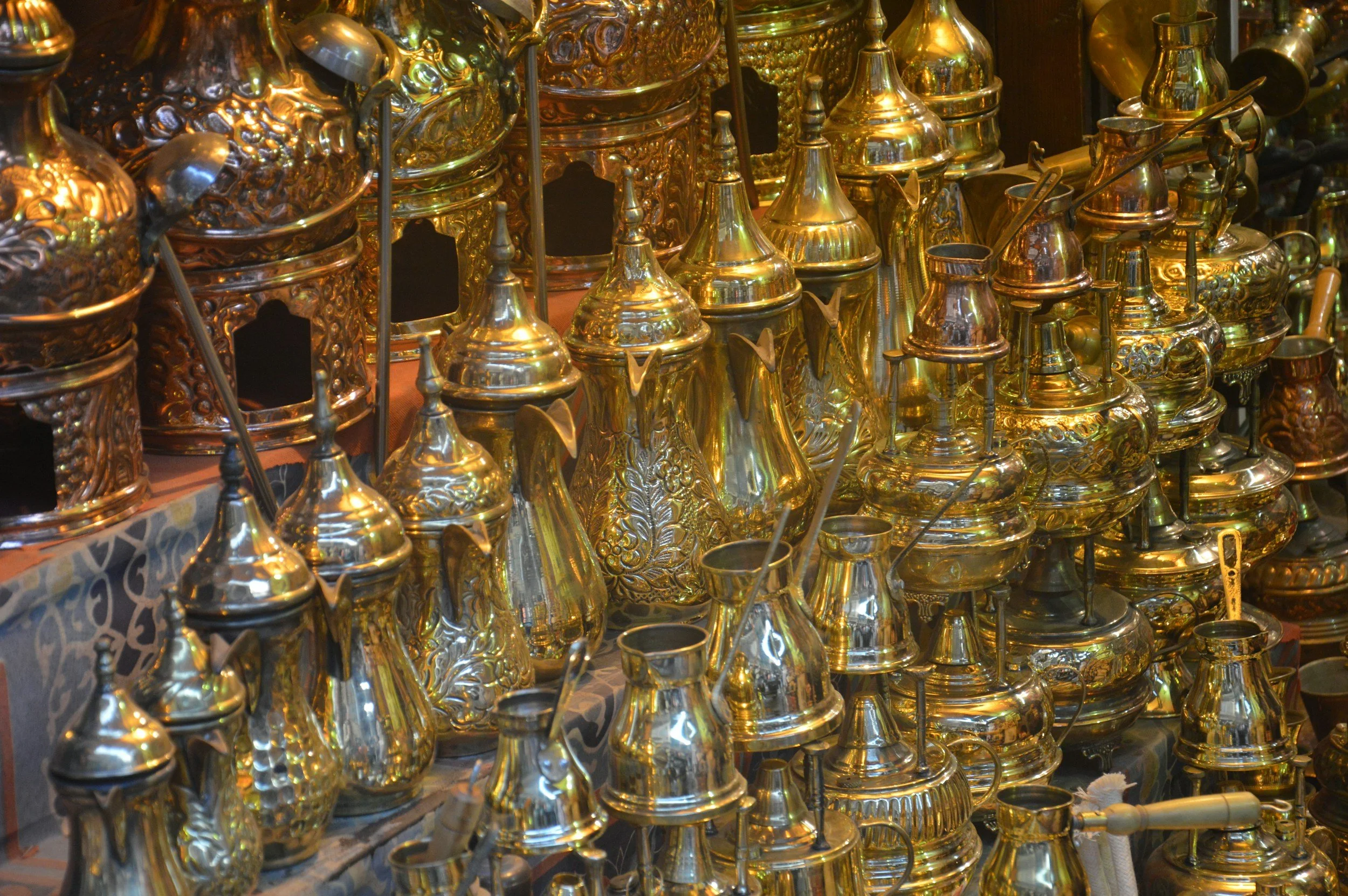 Hand-finished brass lanterns and vessels