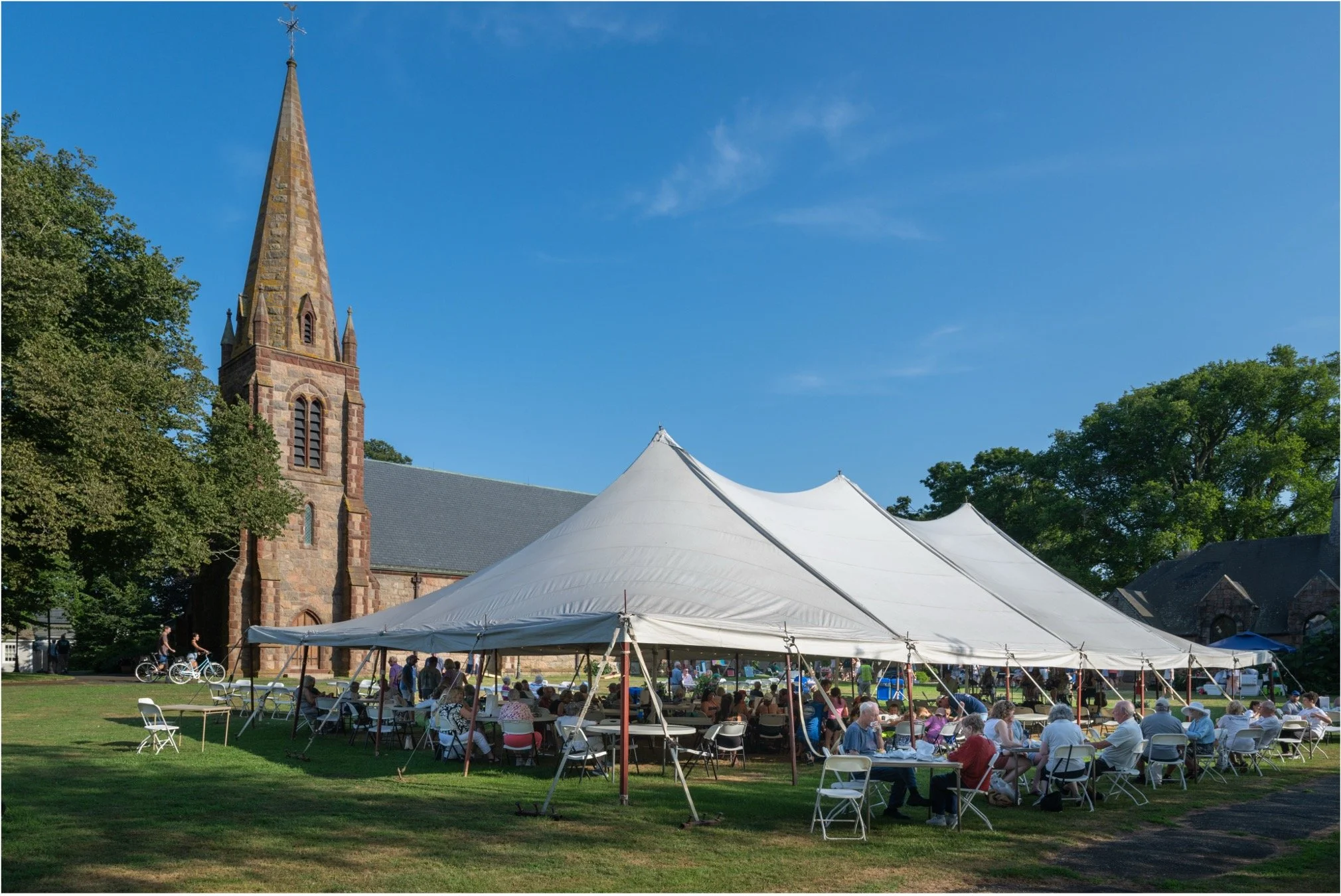The Tent: a  40' × 80' seasonal gathering space on the Great Lawn, June through August.