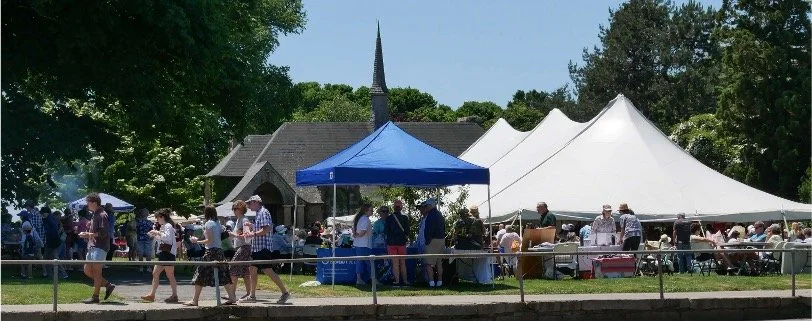 The Tent: a 40' × 80' seasonal gathering space on the Great Lawn, available June through August.