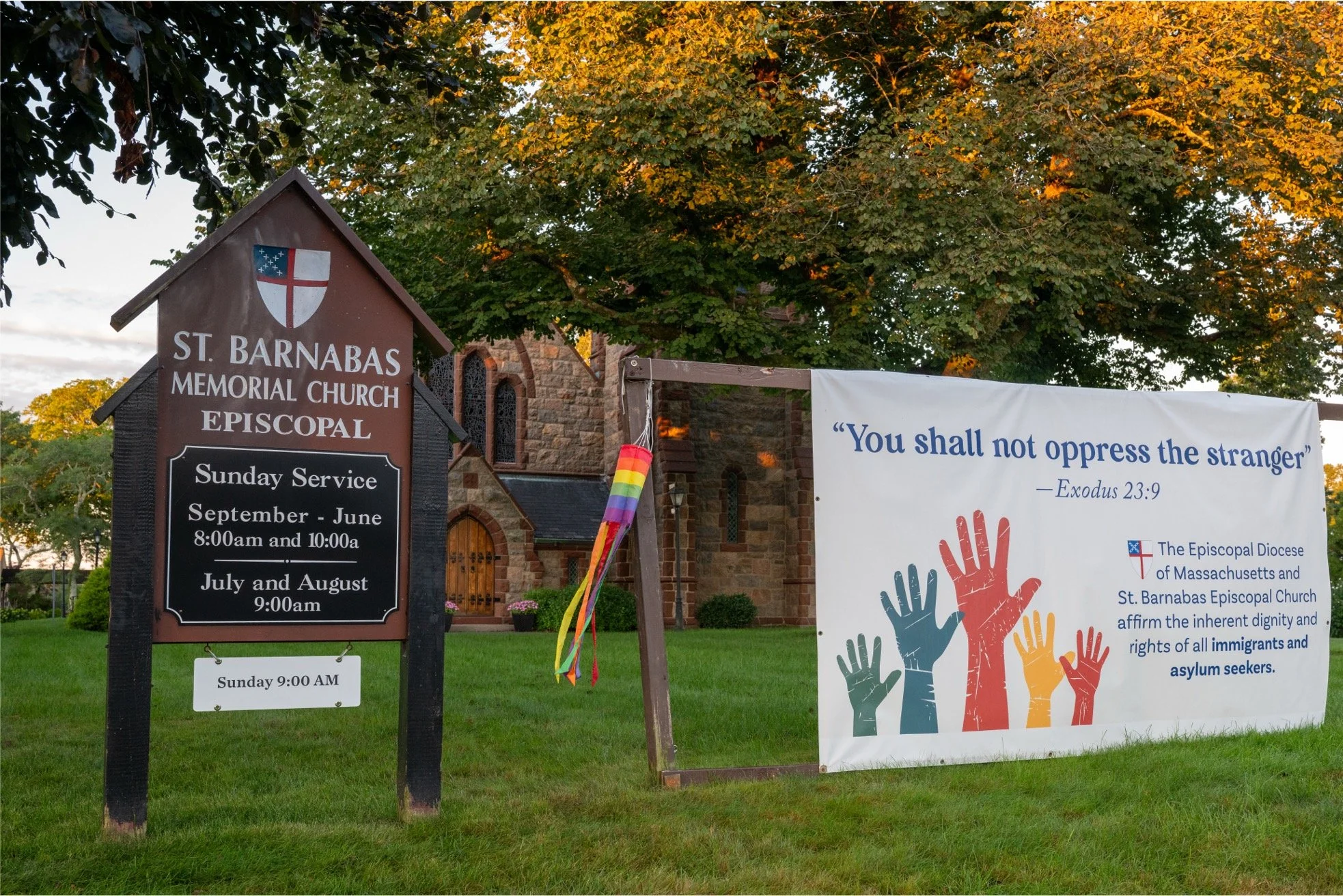 "You shall not oppress the stranger" Banner created by the StB's Social Justice Ministry