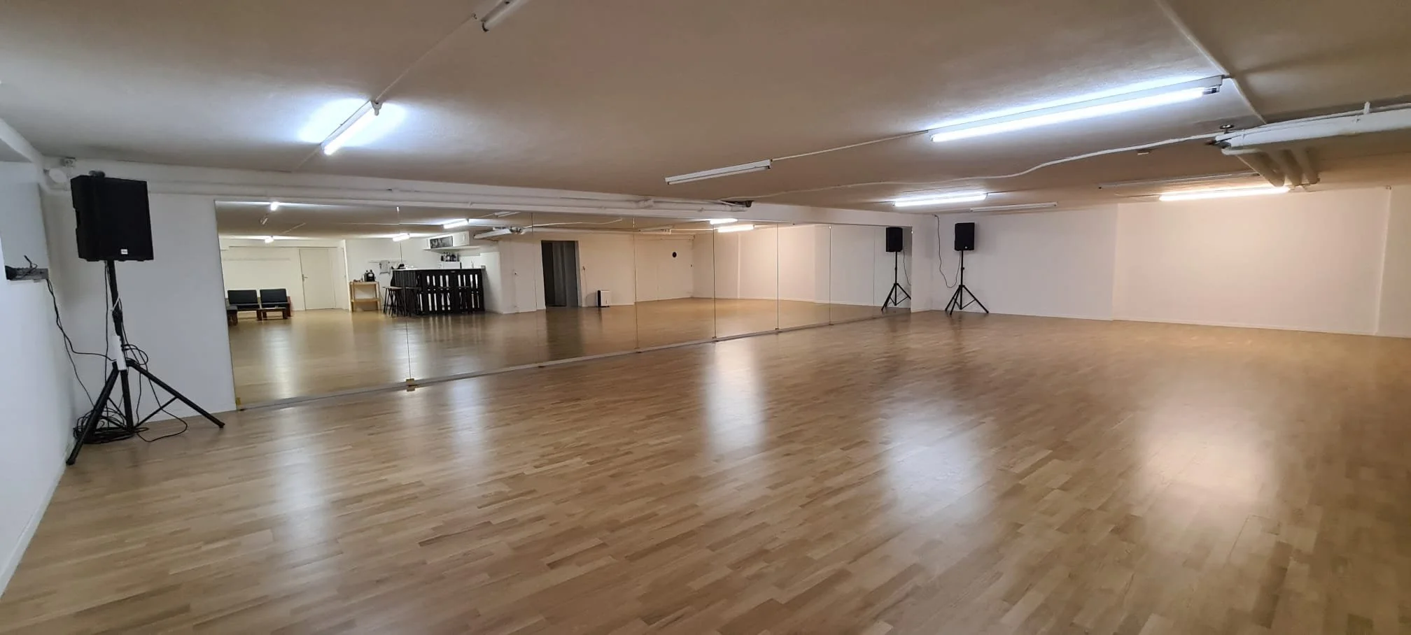 Large rental studio in Zurich with wooden dance floor for classes, workshops and yoga