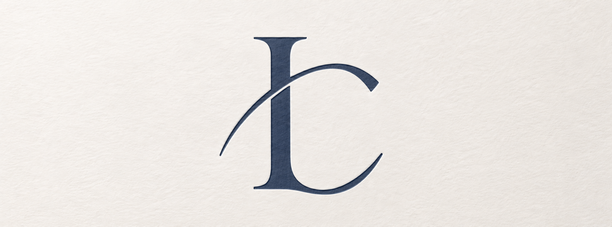 Elegant dark blue letter 'L' with decorative extensions on a cream textured background.
