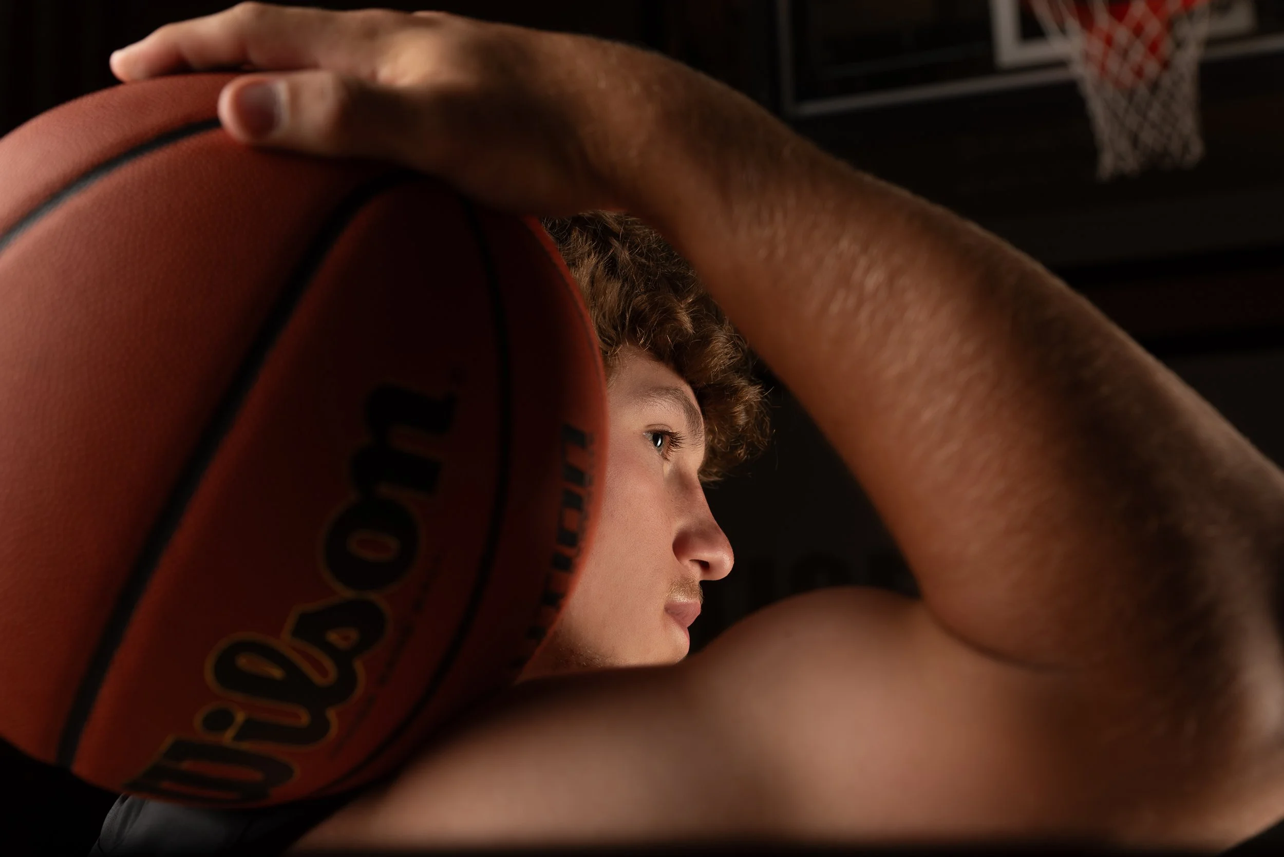 High-impact sports and athletic senior portrait featuring a basketball player in North Central Indiana.