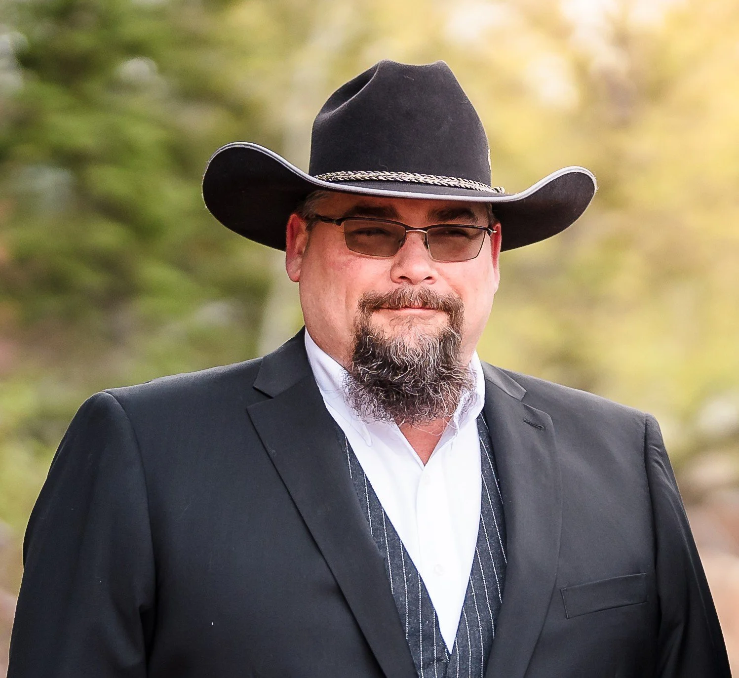 Bill Randall of Pinnacle GC Solutions standing outdoors in Northwest Montana.