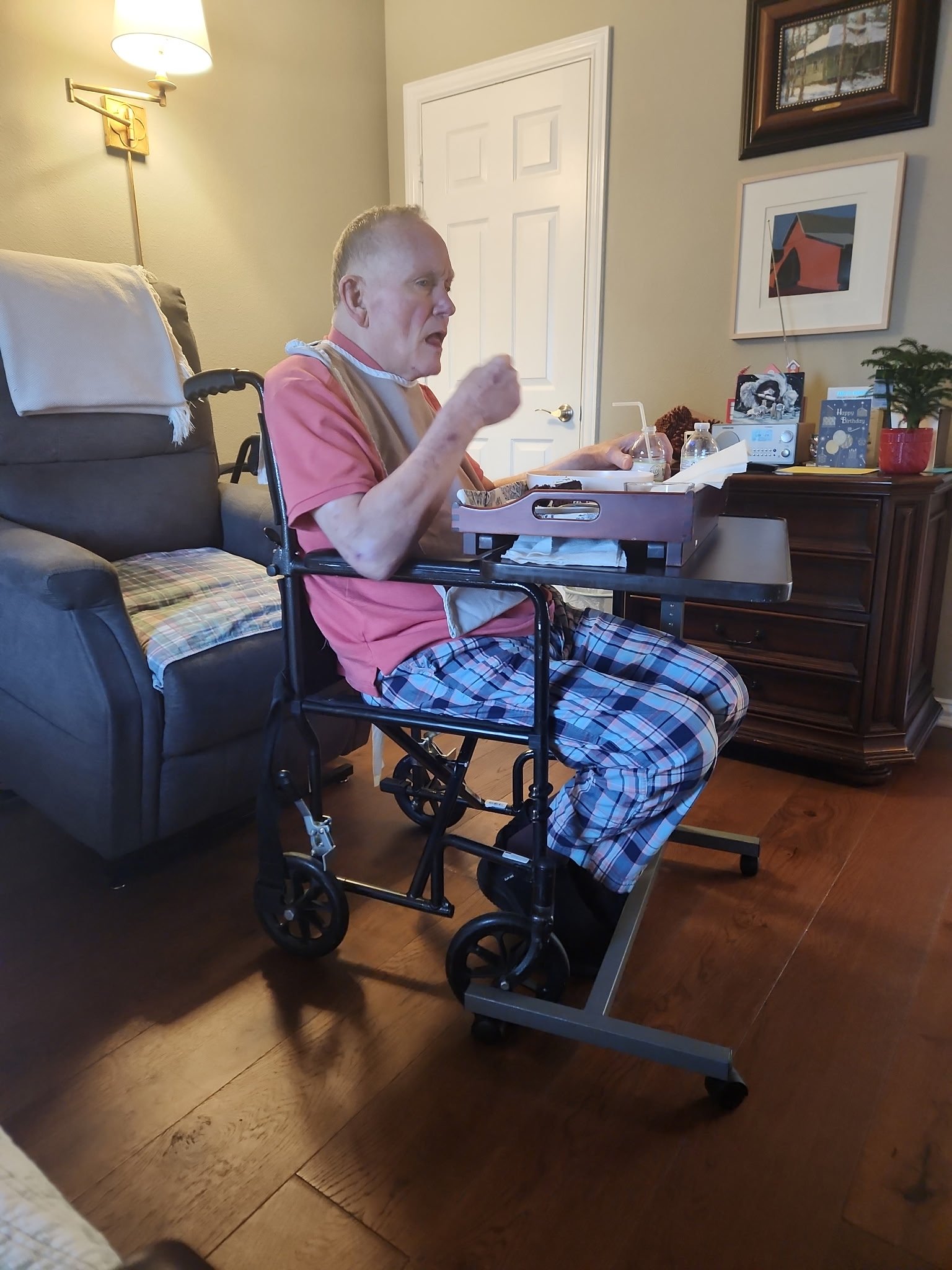 Resident relaxing in the living room at Selah Ridge assisted living home