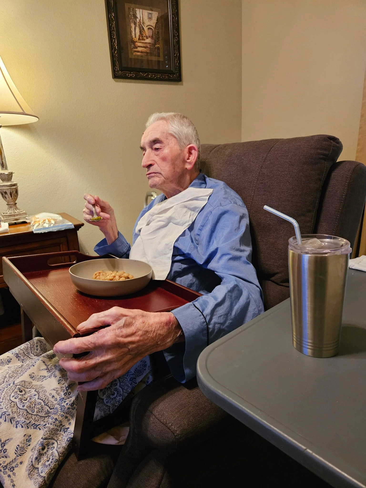 Caregiver assisting resident at Selah Ridge residential care home