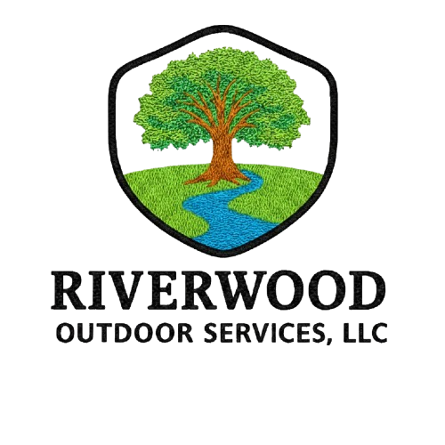 Logo for Riverwood Outdoor Services, LLC featuring a tree with a blue stream flowing underneath, enclosed in a shield shape.