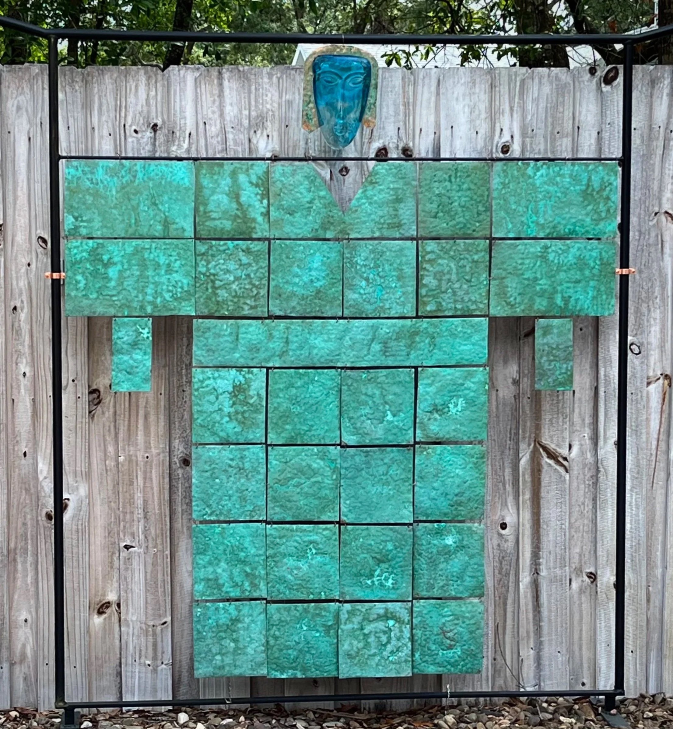 Hand-hammered copper wall sculpture, replicating a kimono form with a verdigris patina.