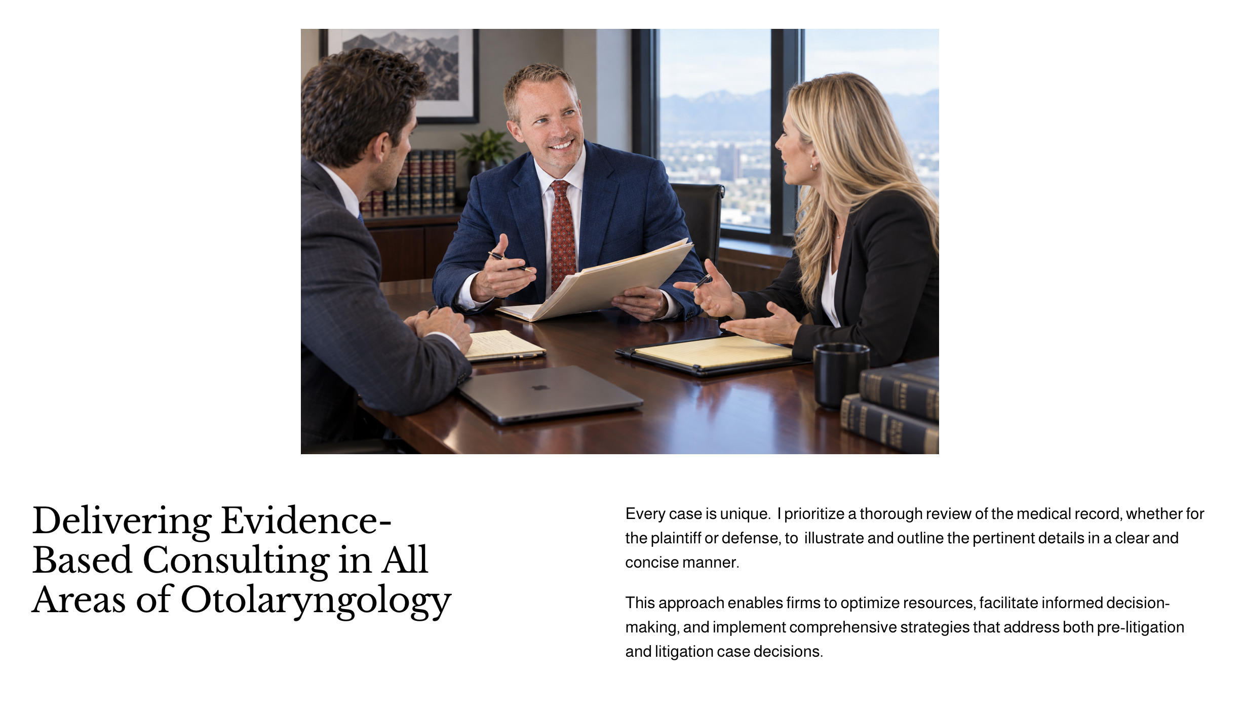 Three professionals, two men and one woman, engaged in a discussion at a conference table in a modern office with large windows showing a cityscape and mountains in the background.  Dr. Joos, an ENT medical expert, visits with his legal team.