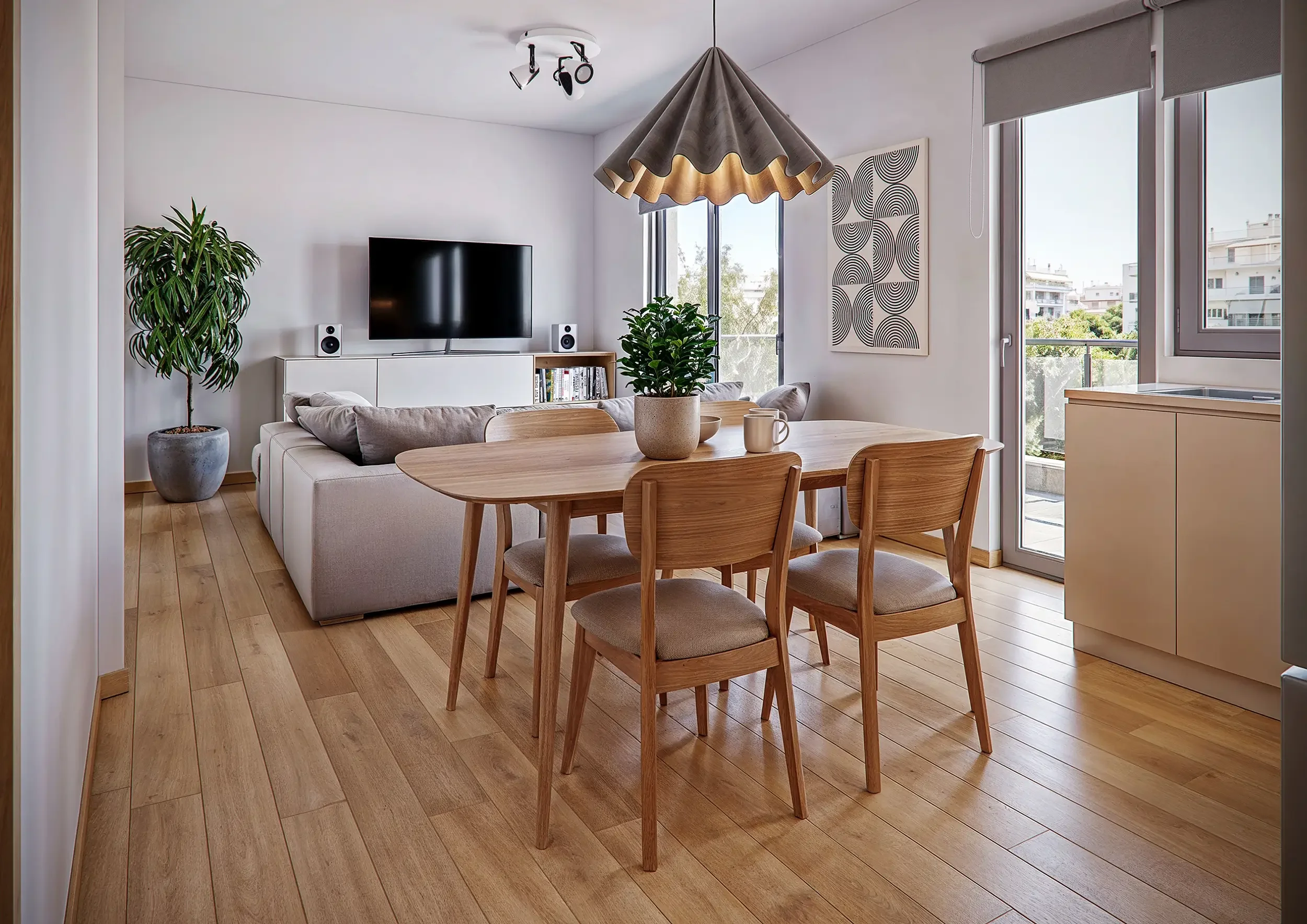 3D rendering και μελέτη επίπλωσης ενιαίας τραπεζαρίας και καθιστικού από την THINKGRAF για την MEGIS Construction – Consulting. Σχεδιασμός εσωτερικού χώρου διαμερίσματος με ξύλινη τραπεζαρία, πτυχωτό φωτιστικό οροφής, ανοιχτή θέα στο μπαλκόνι και ζεσ