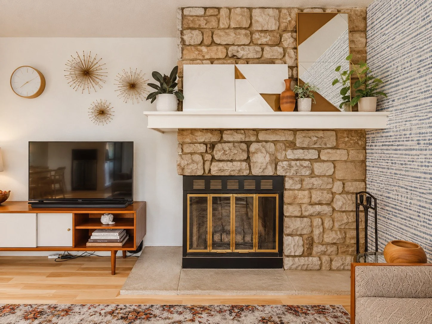 A cozy mid century modern fireplace and mantel