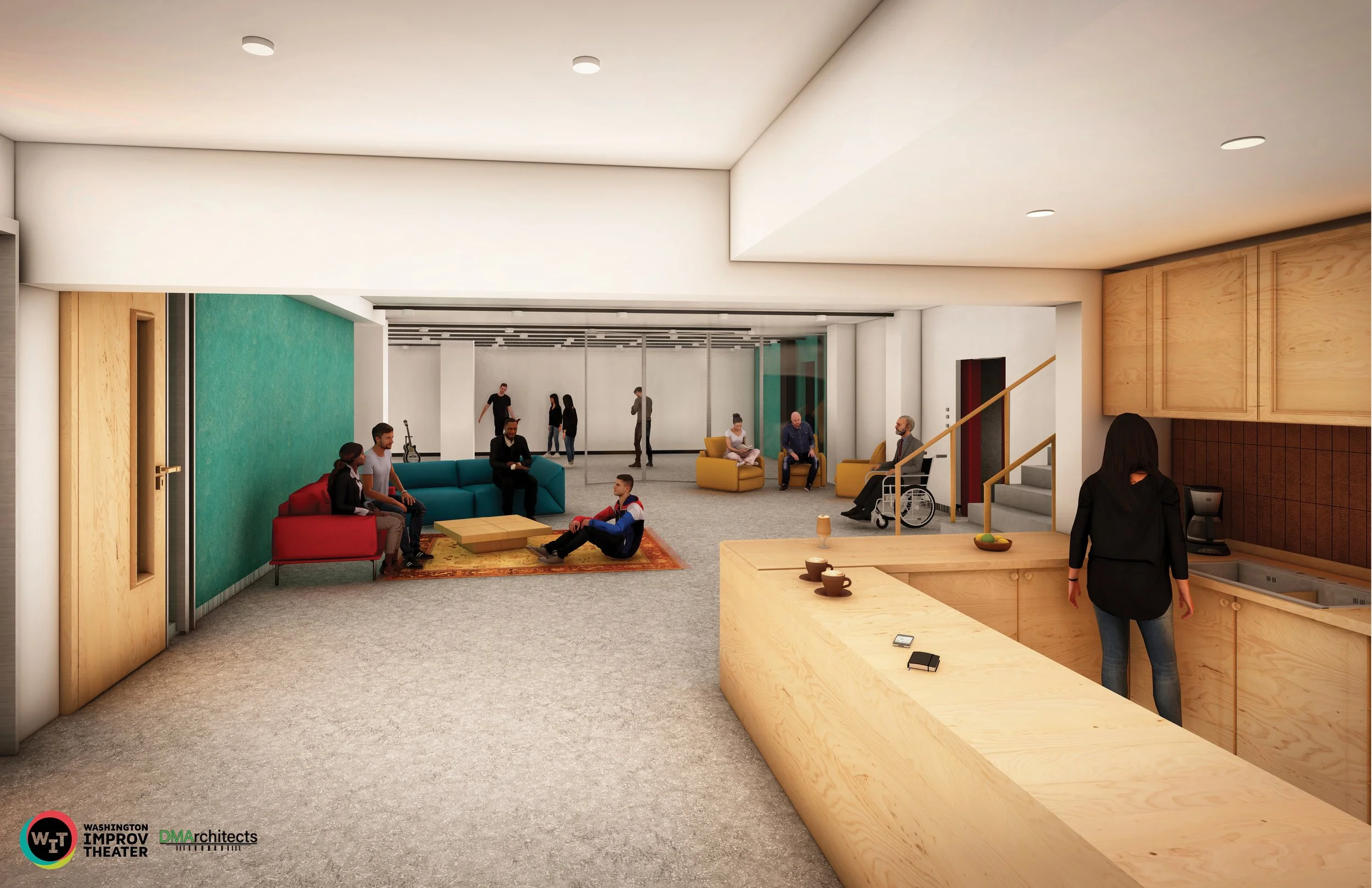 A spacious, modern common area with people sitting and standing, including individuals in wheelchairs, in a building with wooden accents, white walls, and colorful chairs and couches.