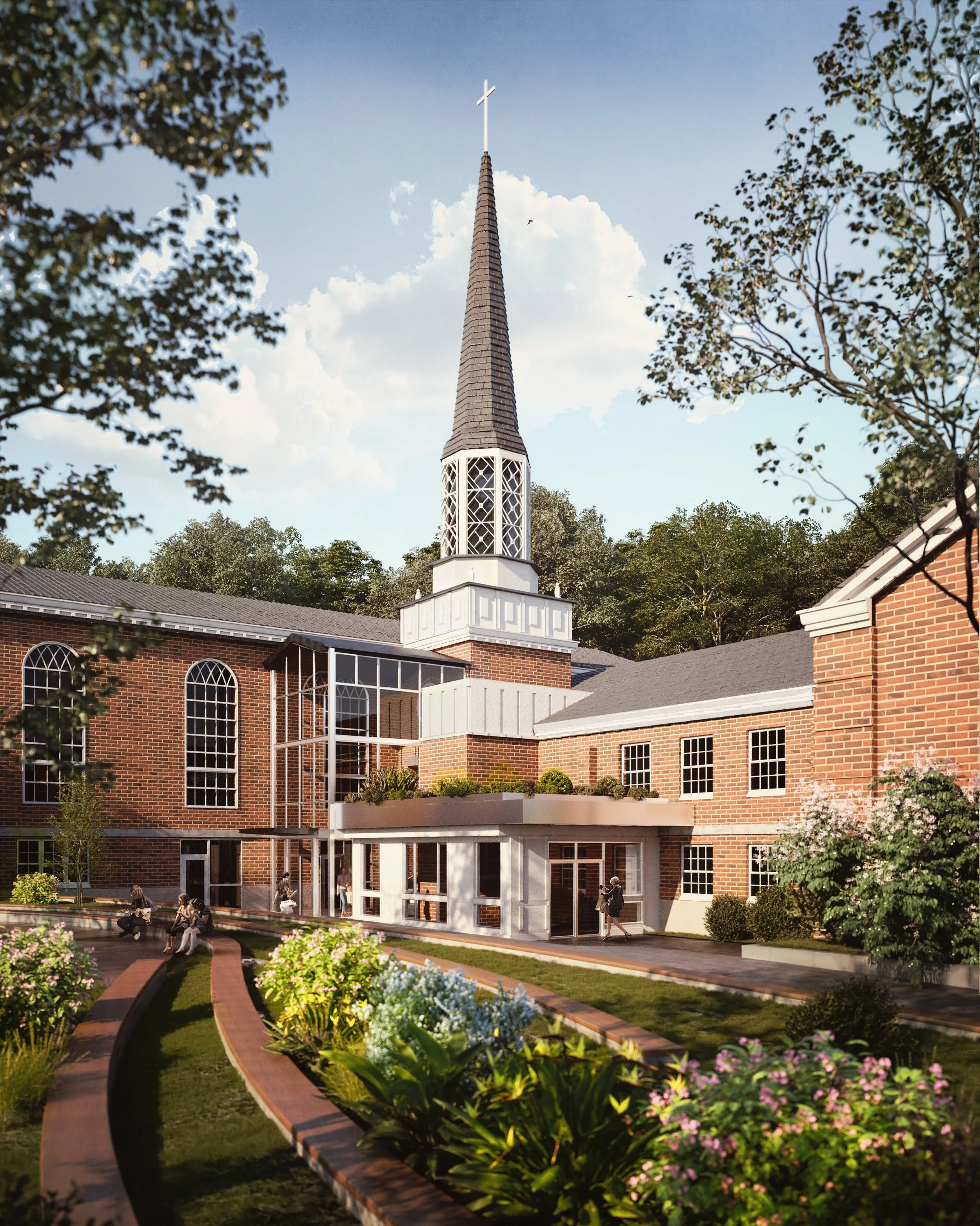 People sitting and walking in a garden outside a brick church building with a tall steeple topped with a cross. The garden has colorful flowers and a curved pathway.