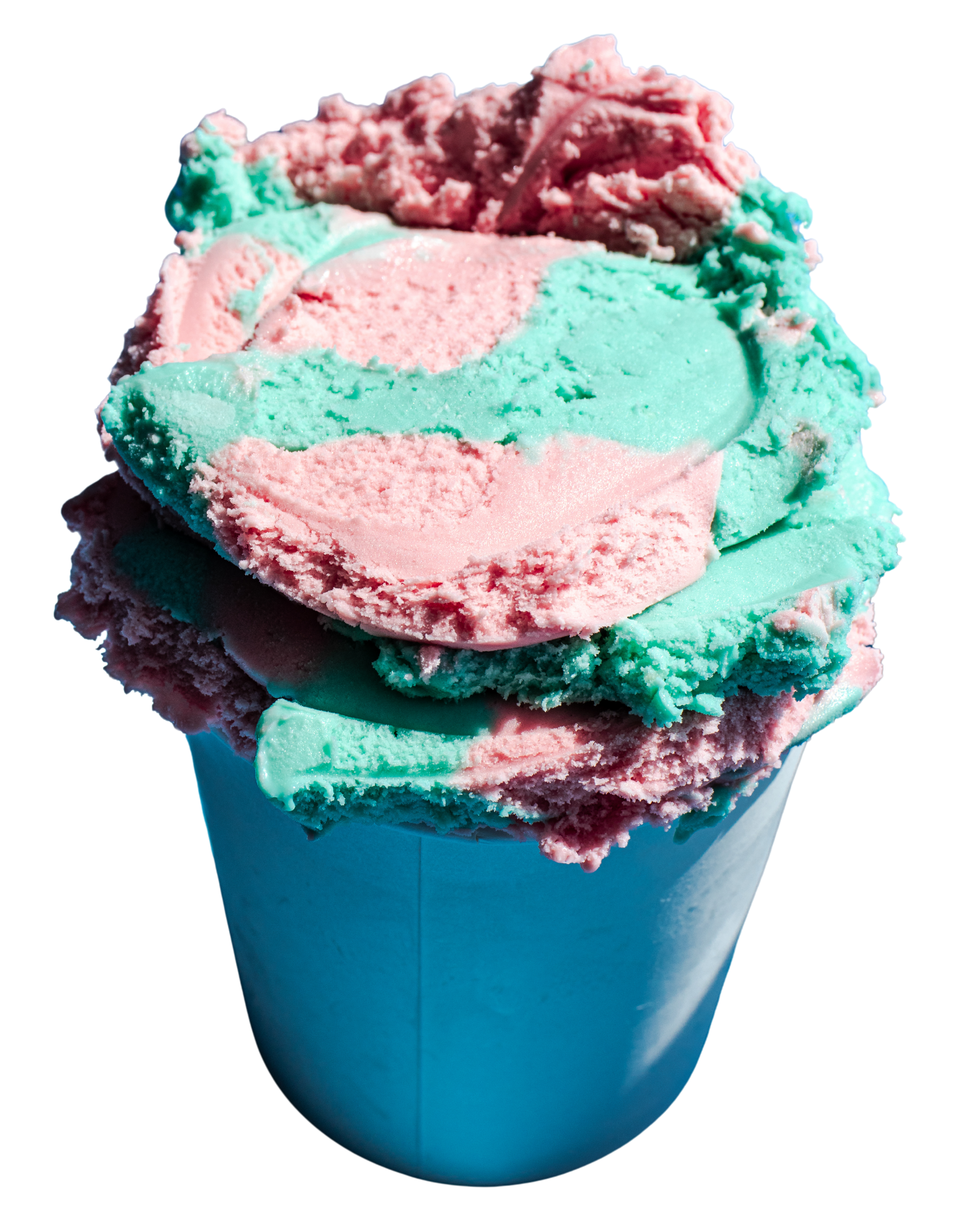 Close-up of a cone filled with pink and green swirl ice cream.