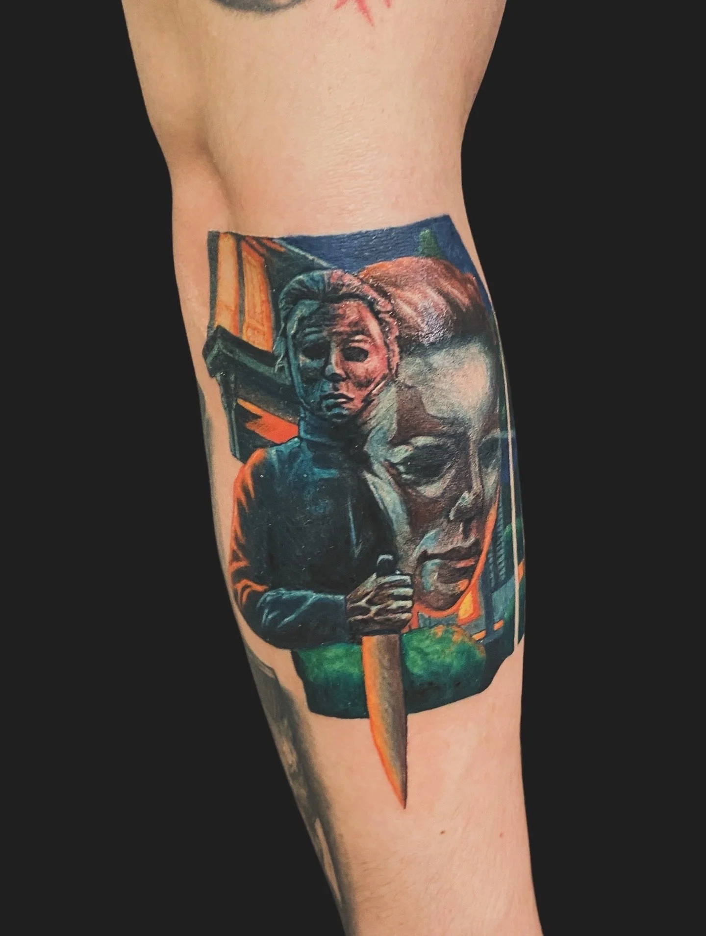 A tattoo on a person's arm depicting a woman speaking into a microphone, with a stern expression, set against a background with vibrant colors.