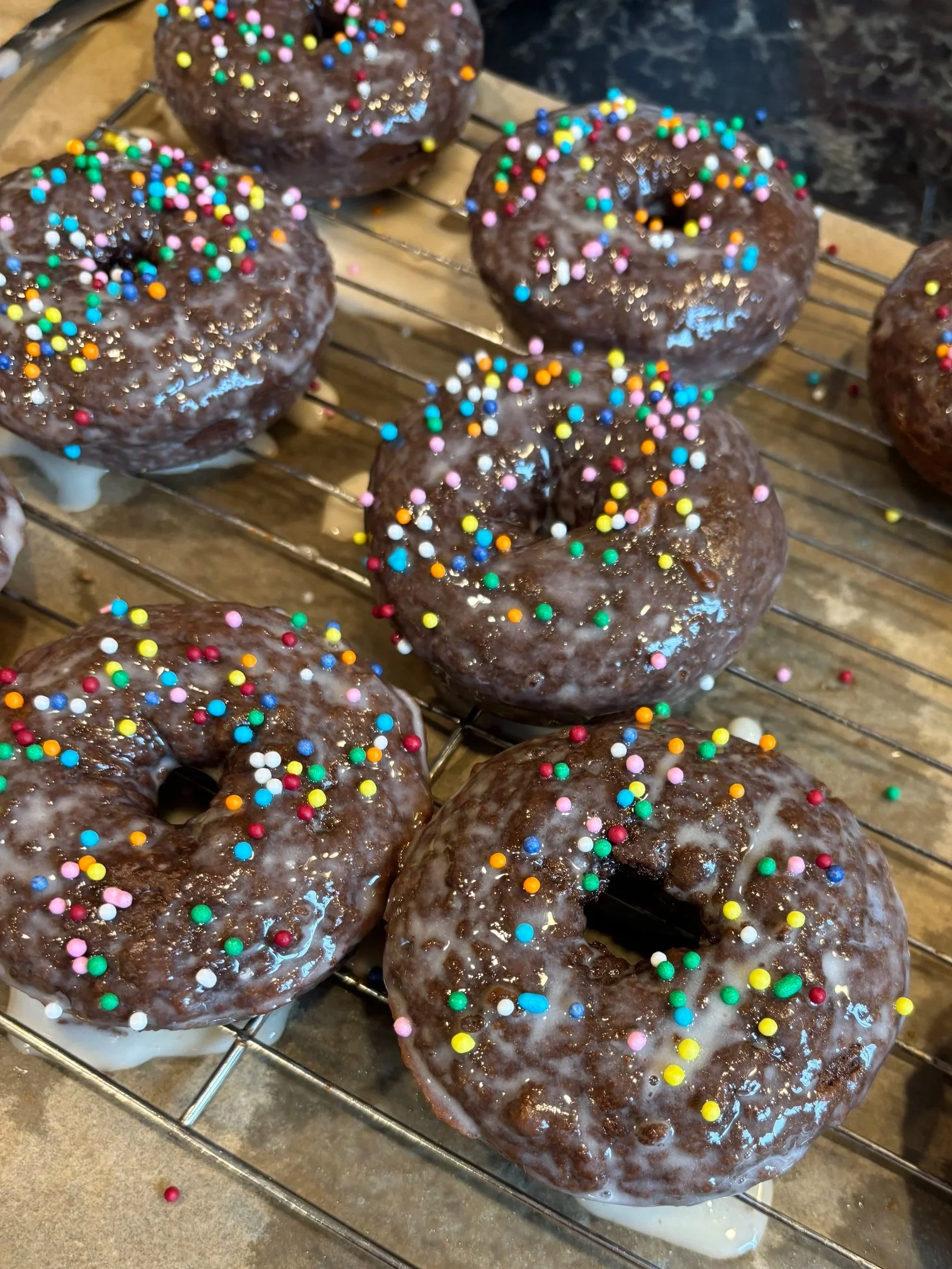 Homemade Baked Chocolate Doughnuts with Vanilla Glaze 