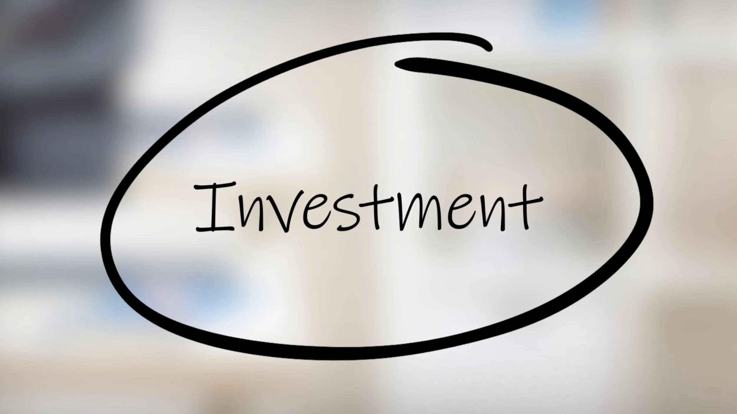 Hand-drawn text inside a circle that says 'Investment'.