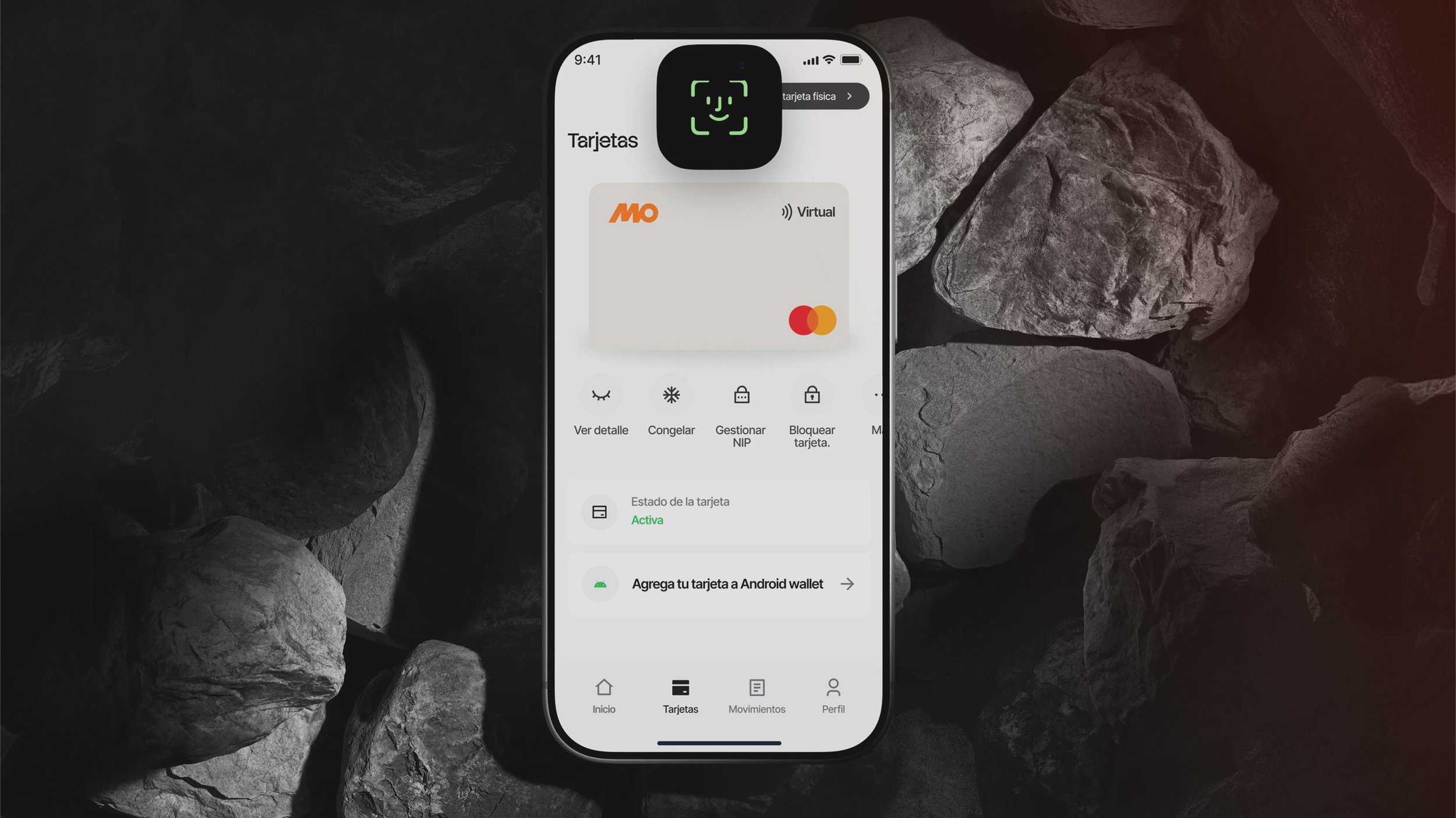 Pantalla de teléfono móvil mostrando la gestión de tarjetas en una billetera digital, con opciones para ver detalles, bloquear y gestionar una tarjeta virtual de la compañía MO, en medio de rocas oscuras.