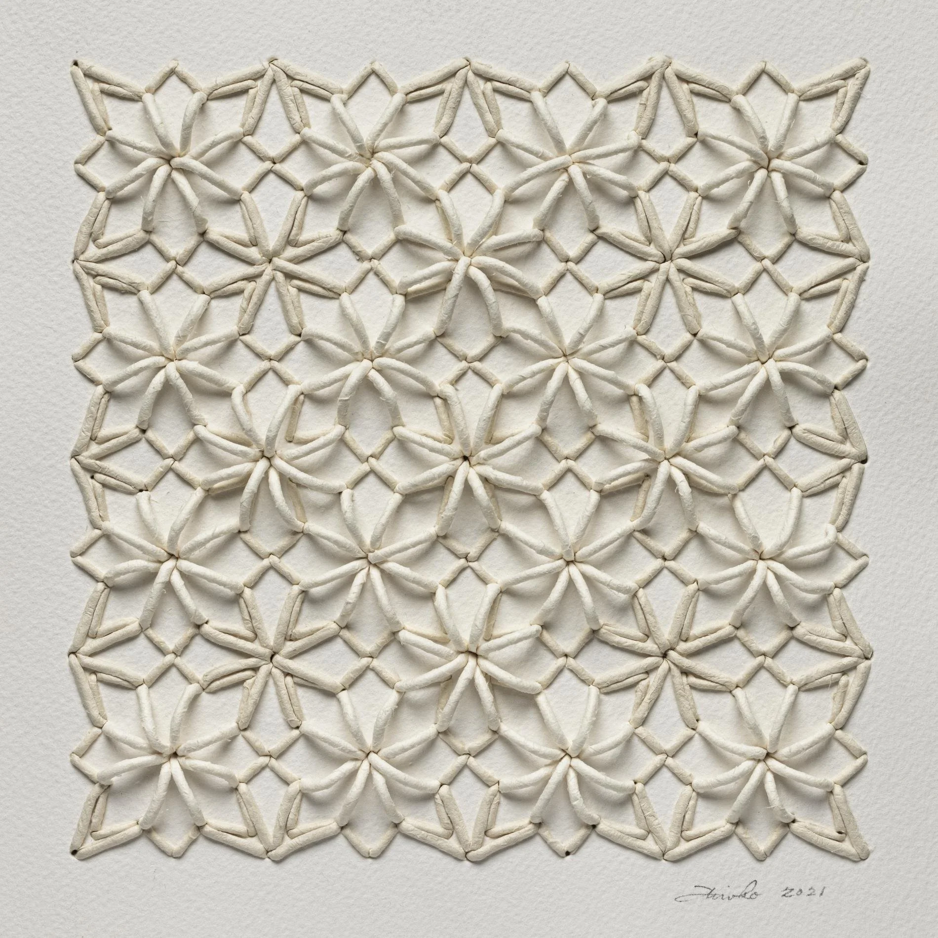 Paper Sashiko #17, 2021. Hand-rolled calligraphy paper cords and hand-punctured watercolor paper. 10" x 10" x 0.25"