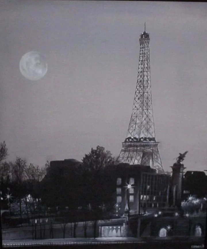 A nighttime scene featuring the Eiffel Tower with the moon in the sky and cityscape below.