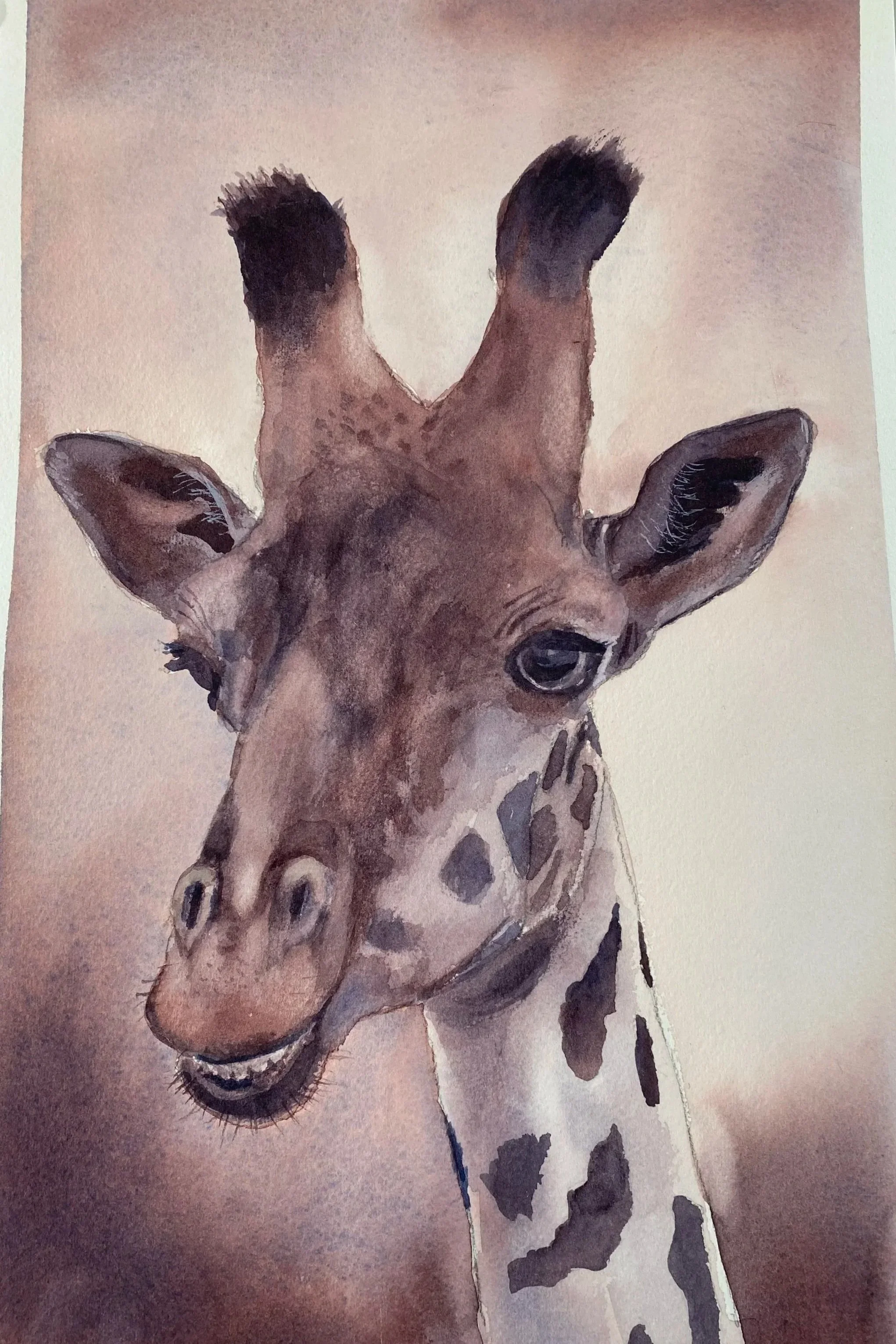 A watercolor painting of a giraffe's head and neck with soft, muted colors.