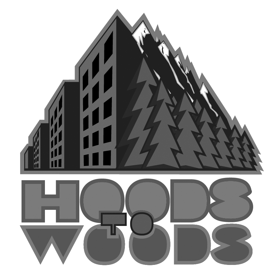 Black and white logo depicting a building on the left, trees on the right, with the text 'HOODS TO WOODS' at the bottom.