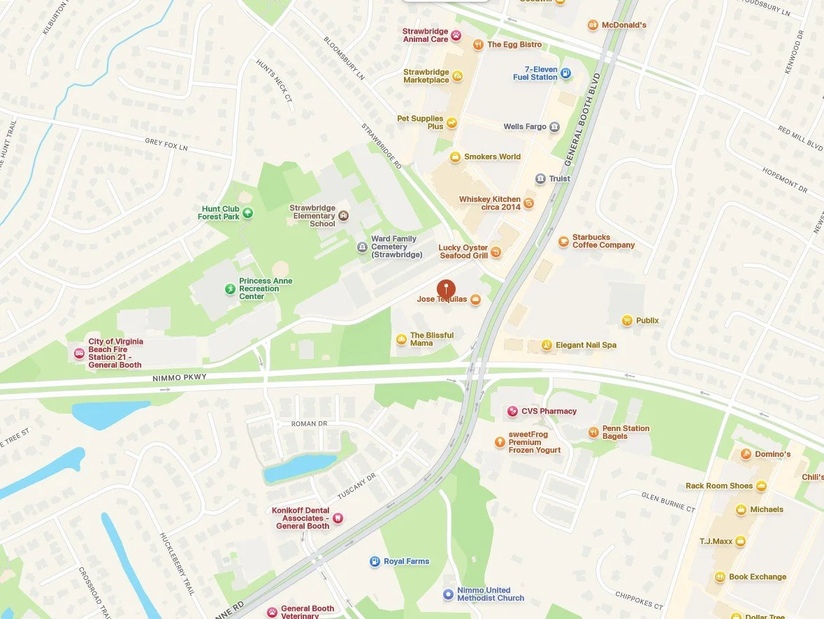 A detailed map of a section of Strawbridge, Virginia, showing streets, parks, schools, churches, and various businesses including restaurants, shops, and service providers.