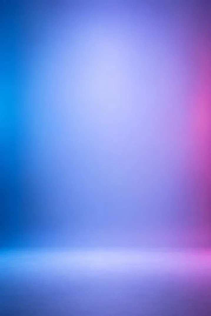 Blurred gradient background with shades of blue, purple, and pink.