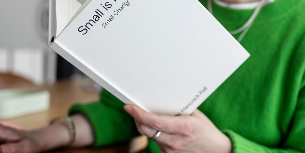 Person reading from a workbook